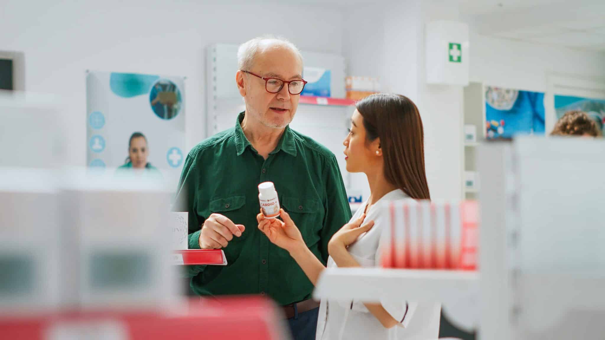 canadian pharmacist assisting patient