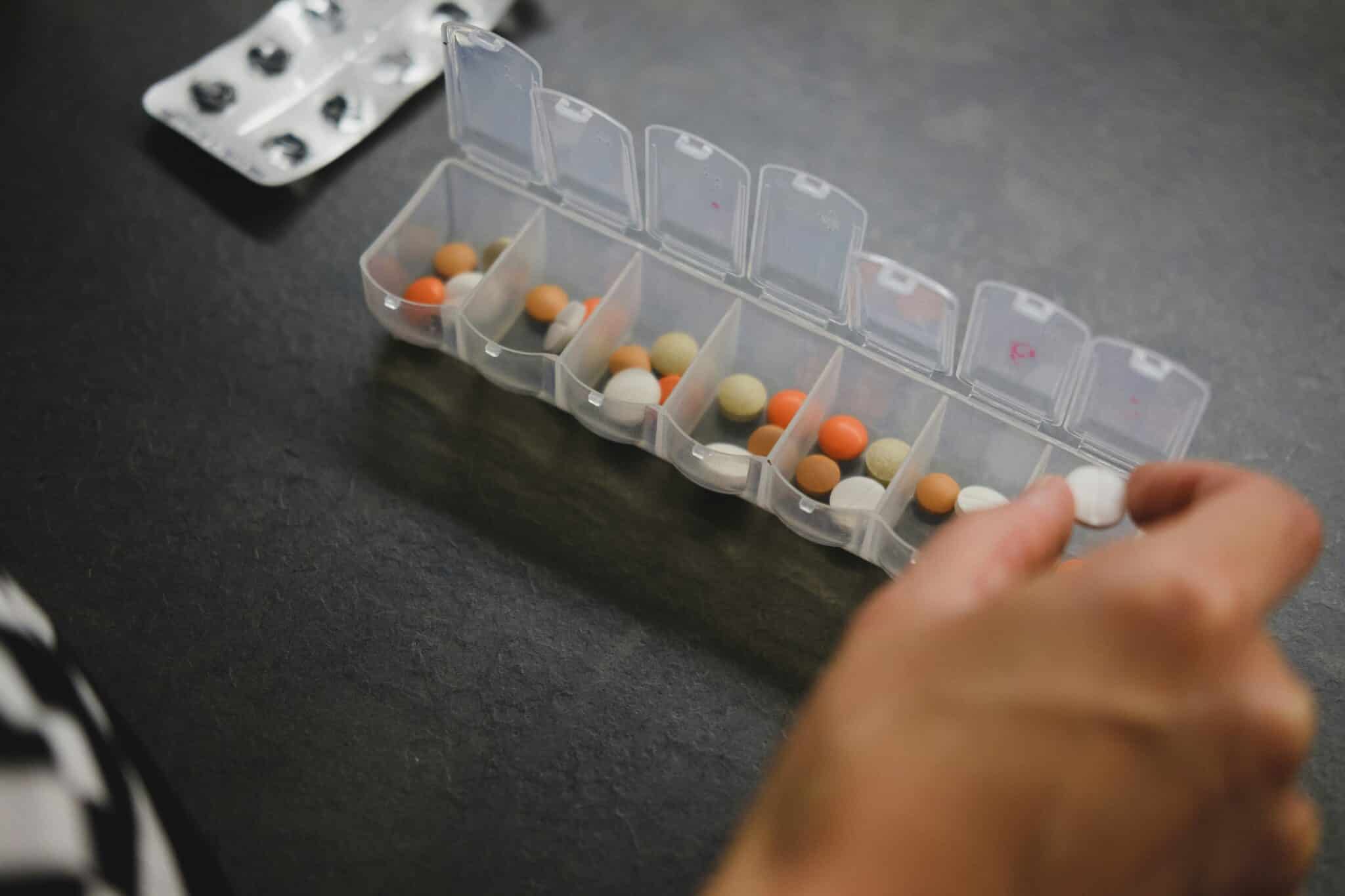 Pill organizer with pills in them